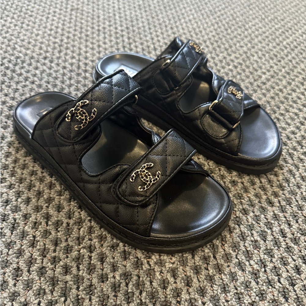CHANEL Black Quilted Sandals with Gold Accents